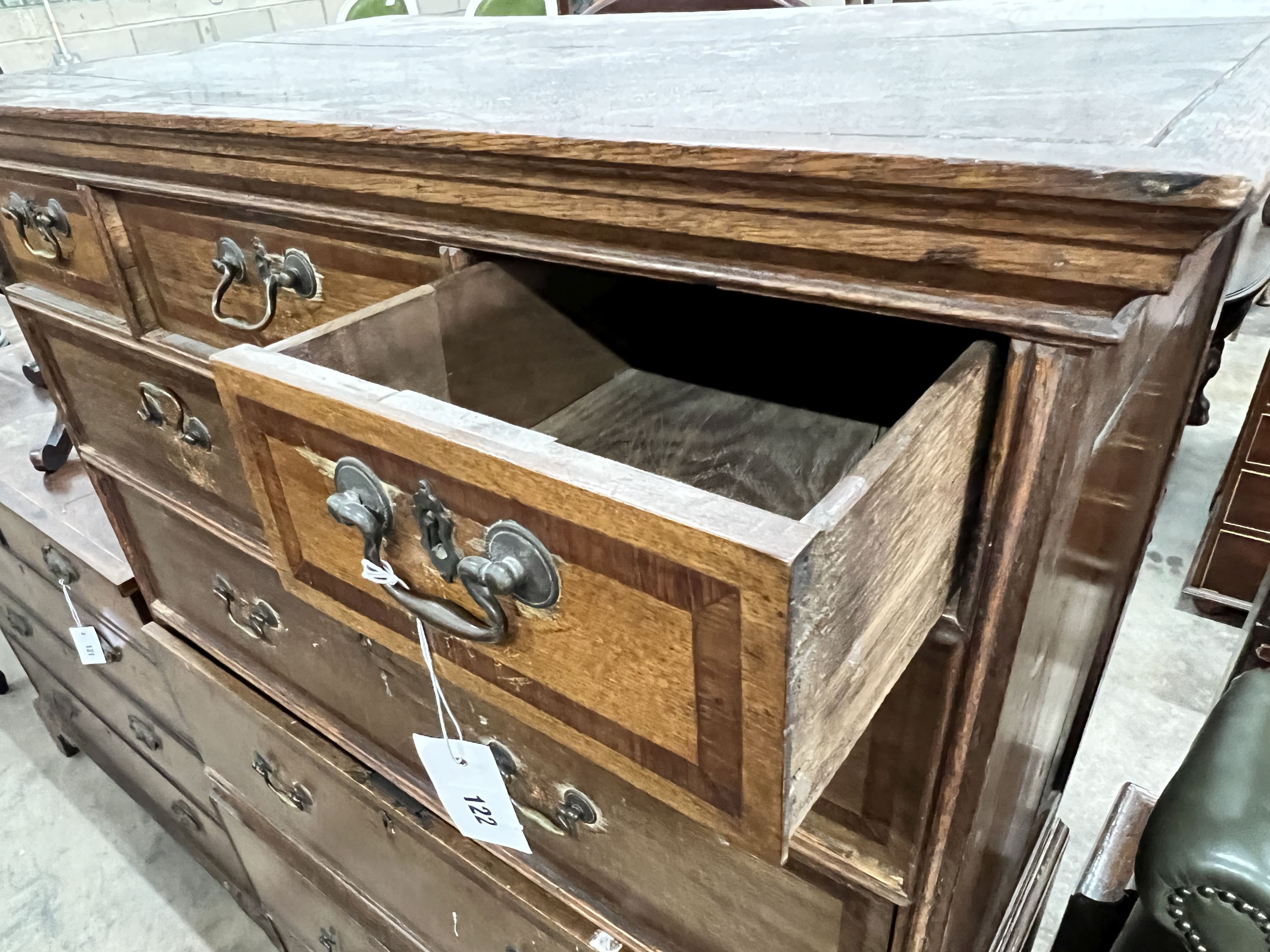 An oak chest on chest, width 97cm, depth 56cm, height 156cm